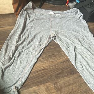 Worn once, has two small holes.